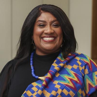 Bell-Ribeiro-Addy MP smiles at the camera.