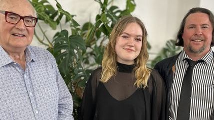 Katie O'Donnell with Richard Blair to her left and and Dr Jaron Murphy to her right.